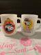 2 Vintage Anchor Hocking Snoopy President Milk Glass Mugs Fire King