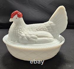 A Westmoreland white milk glass hen on nest Candy/ butter dish with red accents