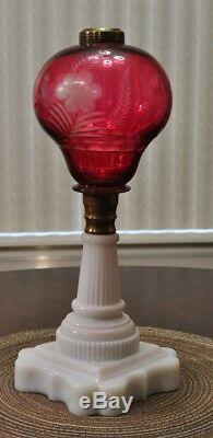 Antique Cranberry cut to clear overlay font on white milk glass fancy base