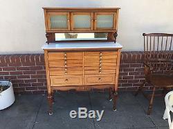 Antique Medical Dental Cabinet with White milk glass 14 drawer