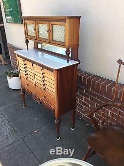 Antique Medical Dental Cabinet with White milk glass 14 drawer