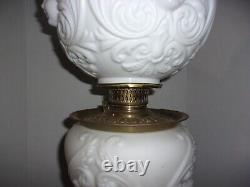 Antique White Milk Glass Cherub or Baby Face Converted Table Oil Lamp