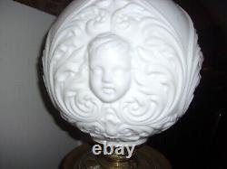 Antique White Milk Glass Cherub or Baby Face Converted Table Oil Lamp