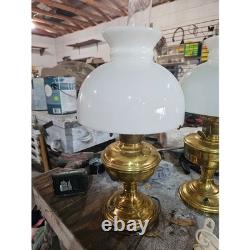 Brass and glass hurricane table lamp with white milk glass shade
