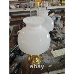 Brass and glass hurricane table lamp with white milk glass shade