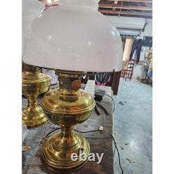 Brass and glass hurricane table lamp with white milk glass shade