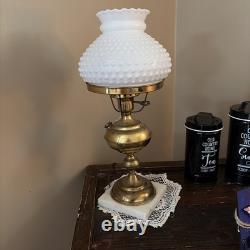 Fenton white milk glass base and hobnail globe lamp with cranberry center works
