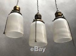 Industrial Milk Glass and Brass Pendant Lights