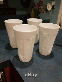 Milk glass pitcher and 8 matching glasses, vintage grape and leaf motif