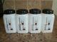 Set Of 4 Mckee Tipp Stick Pots Milk Glass Range Shakers