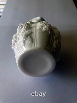 Tall milk glass flower vase with grape vine design 10.1875 inches