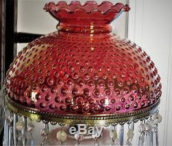 Vintage Victorian milk glass with ruby hobnail Fenton lamp with prisms